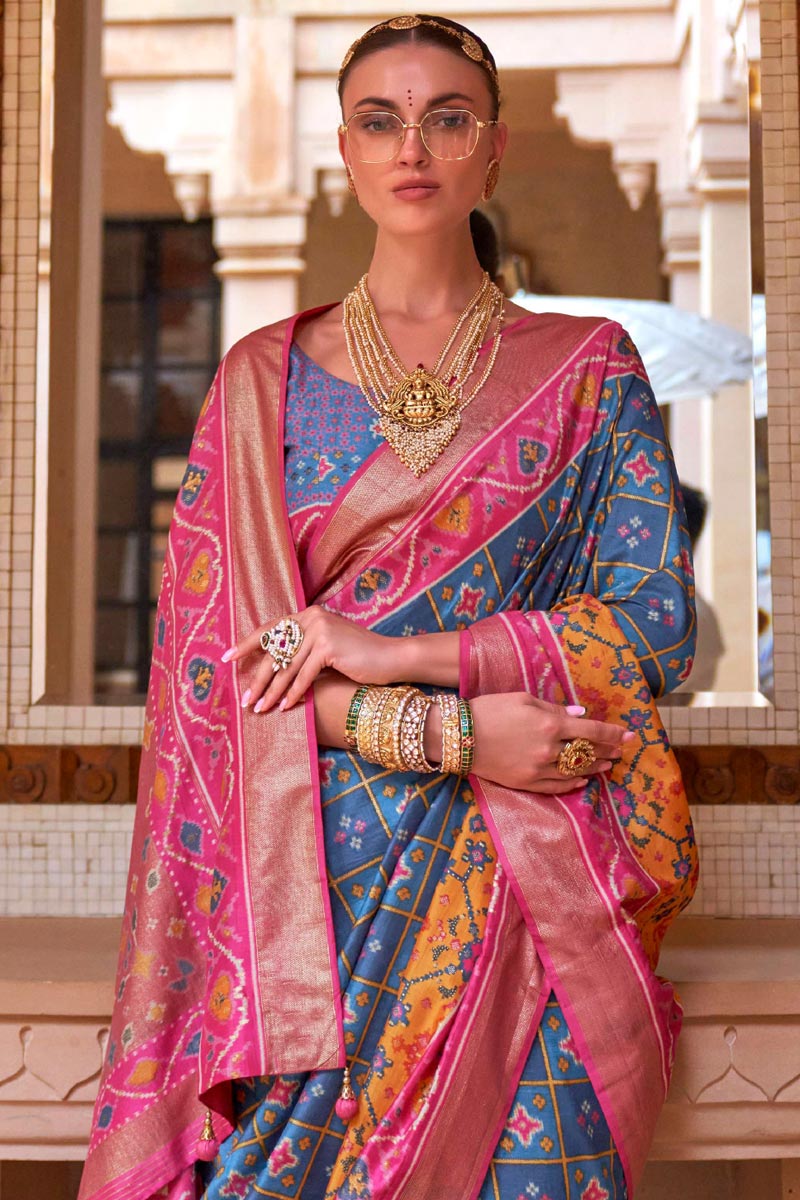 Glamorous Blue Patola Silk Saree In Function Wear