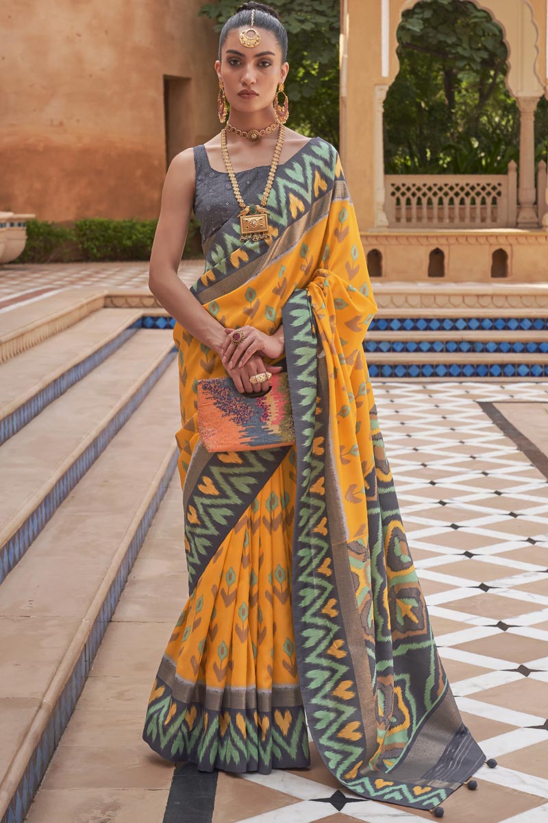 Marvellous Printed Work On Art Silk Fabric Patola Saree In Yellow Color
