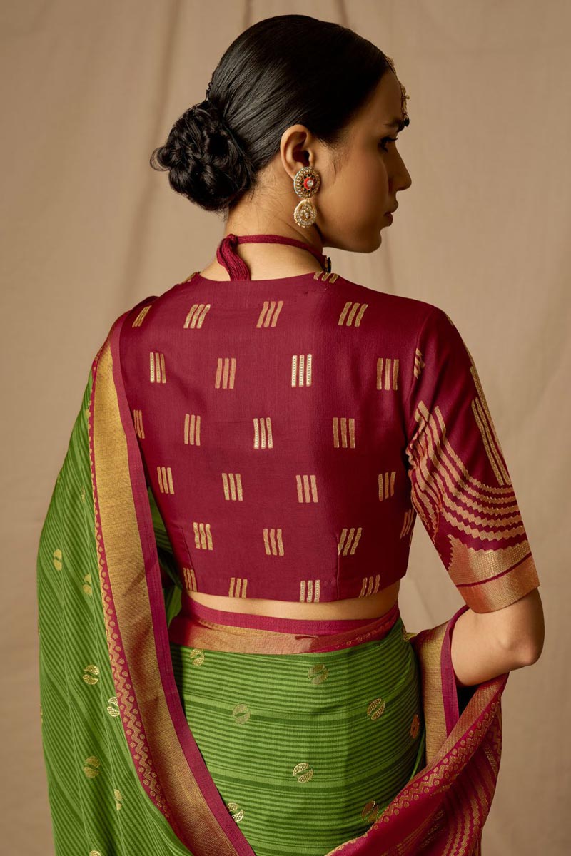 Soothing Weaving Work On Green Brasso Fabric Saree